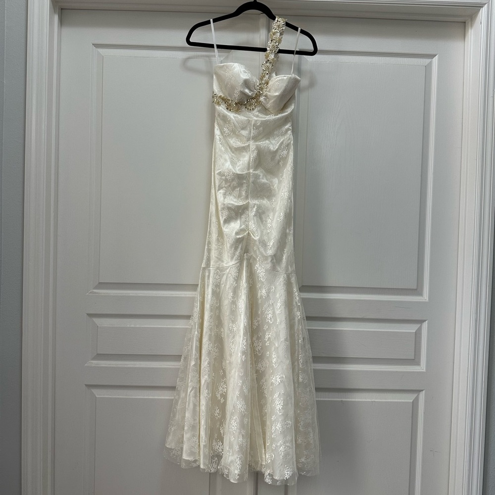 Xscape mermaid style embellished white and gold lace prom gown